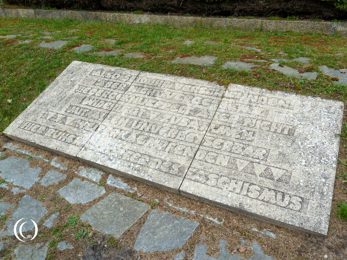 Memorial plaque for the 56 victims found in a mass grave at this cemetery in Karlshagen