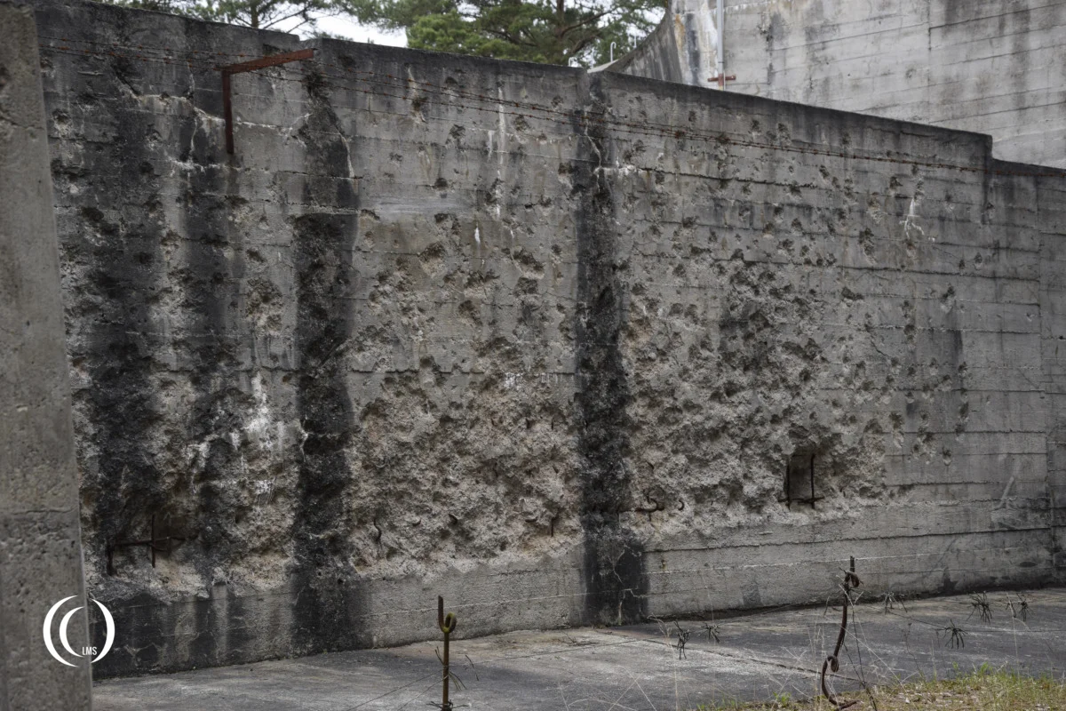 Damaged bunker wall of gun emplacement B2 of Battery Schleswig-Holstein in Hel, Poland