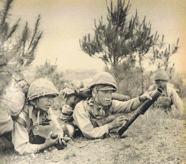 Japanese Soldiers during the Zhejiang Campaign in 1942 using the Type 89 Grenade Dispenser - Courtesy Wikipedia
