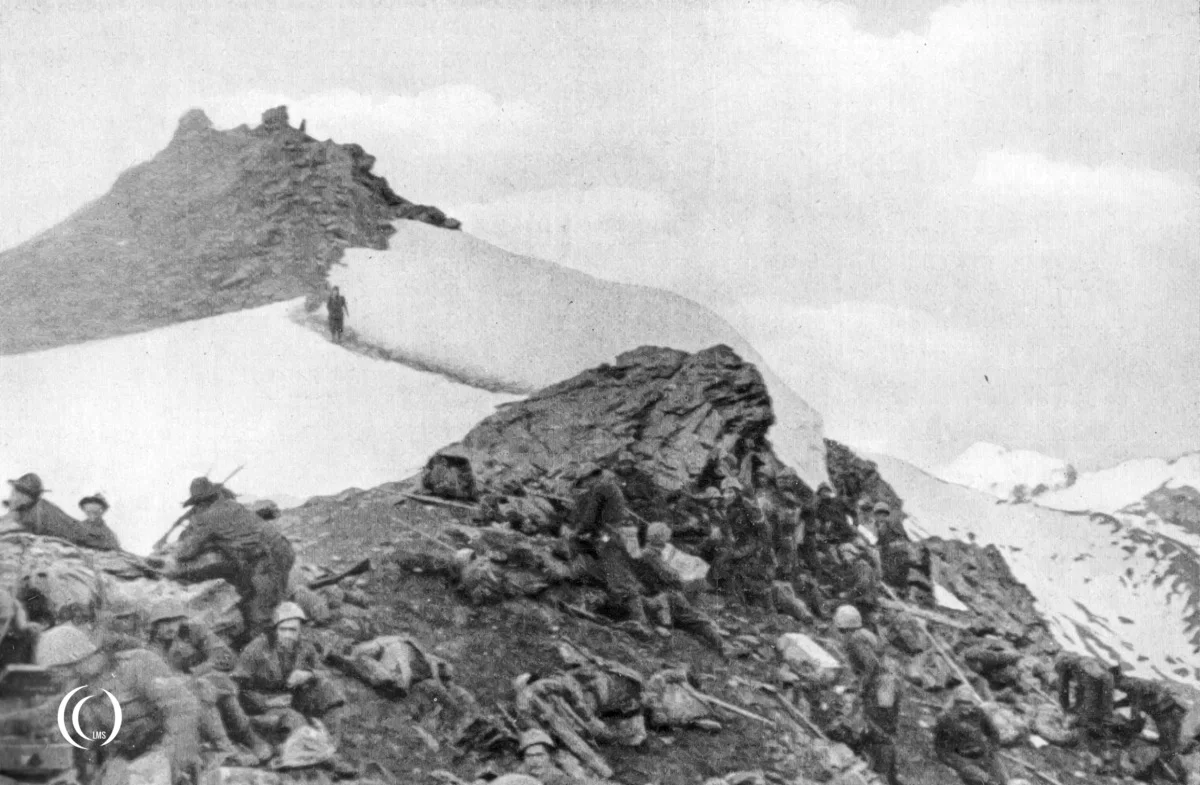 Soldiers on snowy mountain peak