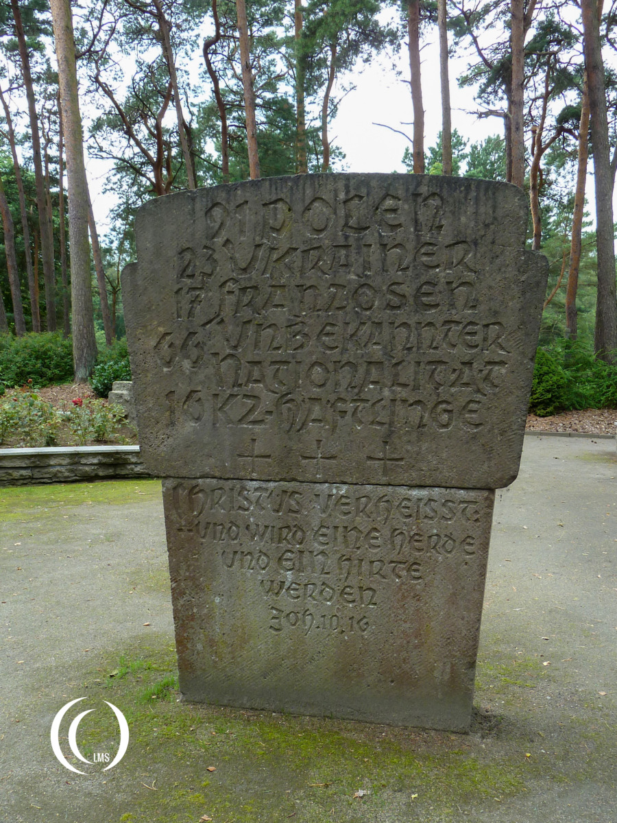 Memorial stone marking the mass grave of forced laborers at Karlshagen War Cemetery Germany