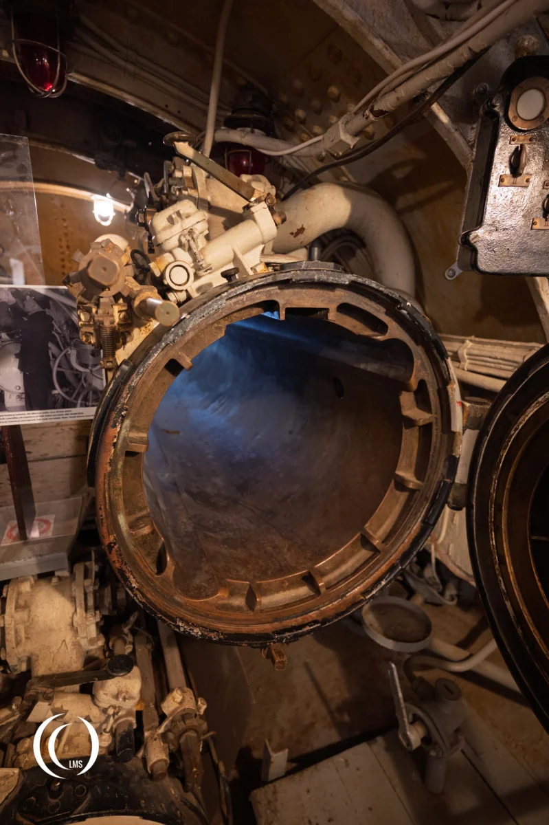 Torpedo tube II with opened hatch inside submarine Vesikko