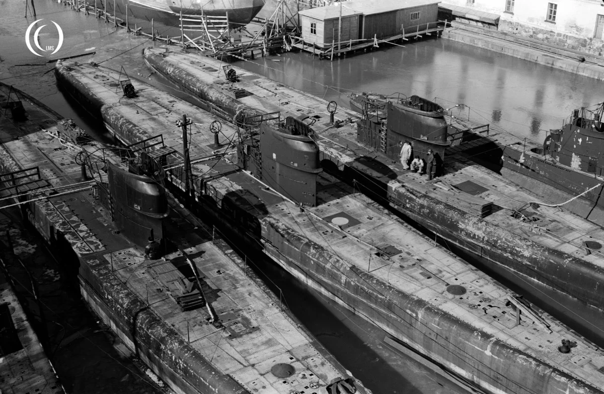 Finnish submarines being stripped of their equipment at the Suomenlinna shipyard before being towed abroad for scrapping.