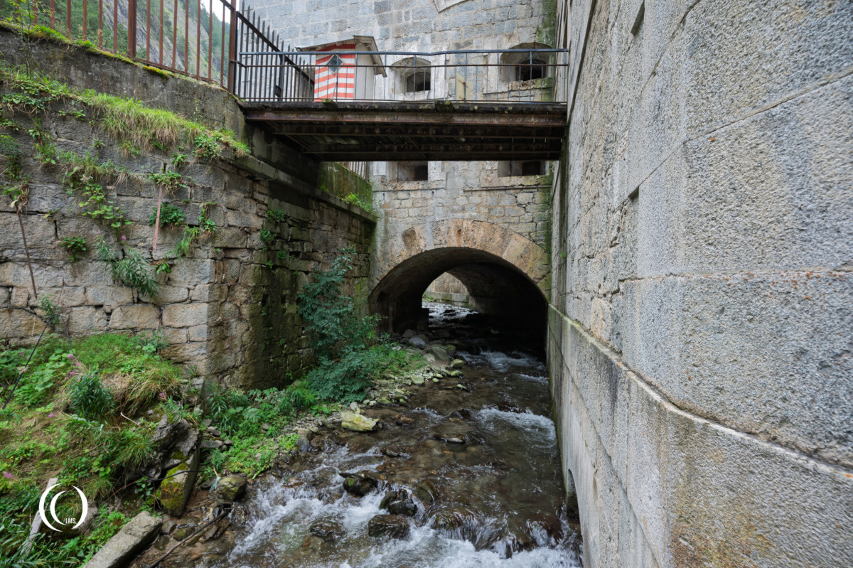 Stream of the Stille Bach underneath the entrance of Festung Nauders, Austria
