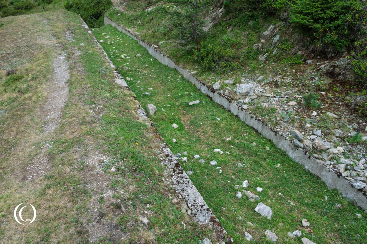 Trench line towards the south MG-position of bunker (Opera VI) of the Pian dei Morti barrier in Alto Adige, Italy