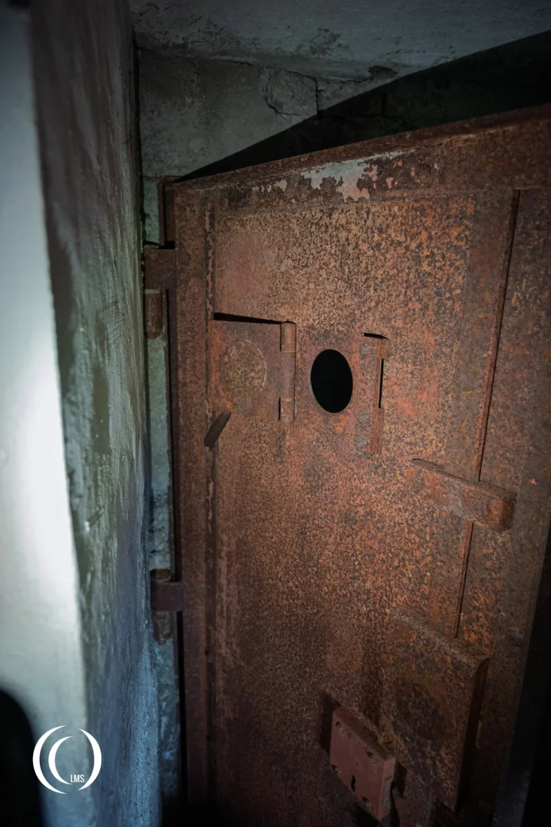 Metal door inside bunker (Opera VI) of the Pian dei Morti barrier in Alto Adige, Italy