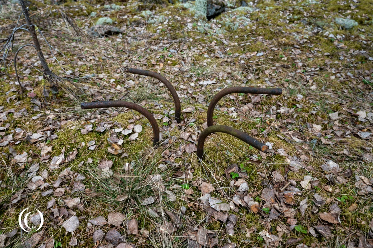 Steel hooks for camouflage nets at bunker C12 of the Salpa Line at Askola, Luumäki, Finland