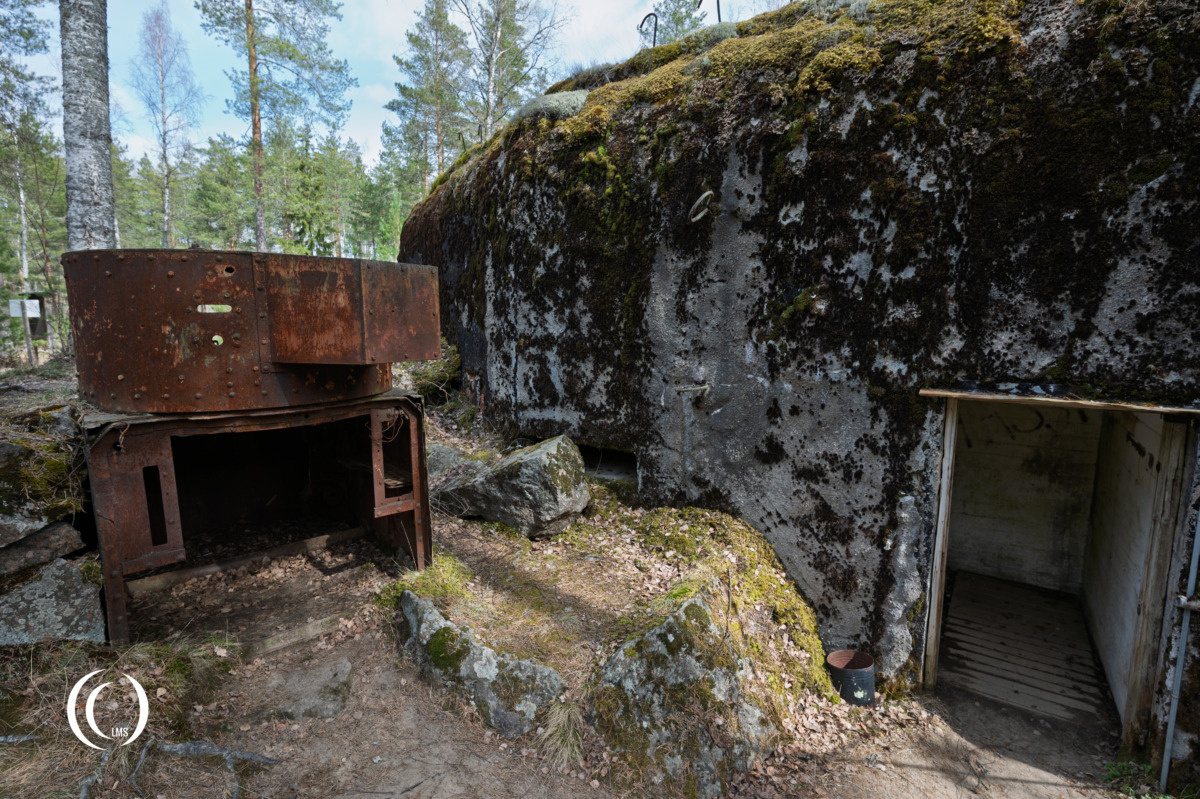 Machine gun bunker C11 entrance and BT-5 turret at Askola, Luumäki, Finland