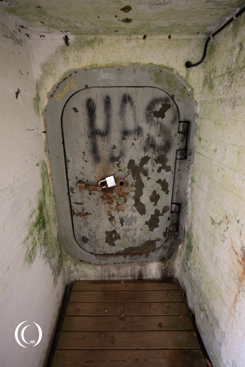 Steel entrance door of bunker C11 at Salpa-Asema Askola, Luumäki, Finland