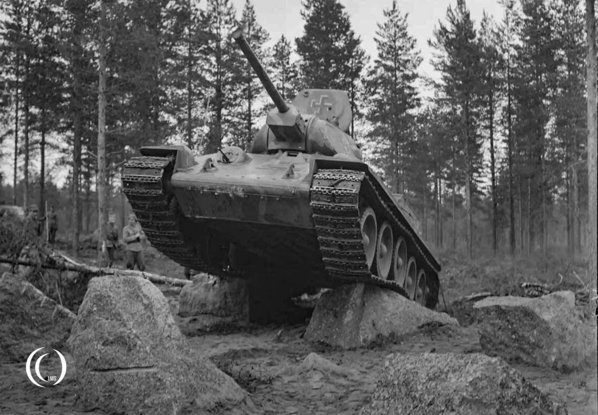 T-34 tank testing anti-tank obstacles at Salpa Line, Luumaki, on 29 June 1943