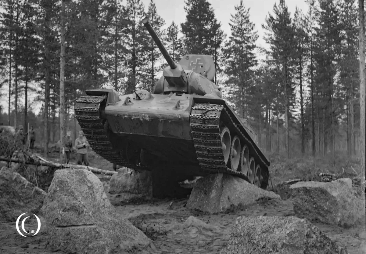 T-34 tank testing anti-tank obstacles at Salpa Line, Luumaki, on 29 June 1943